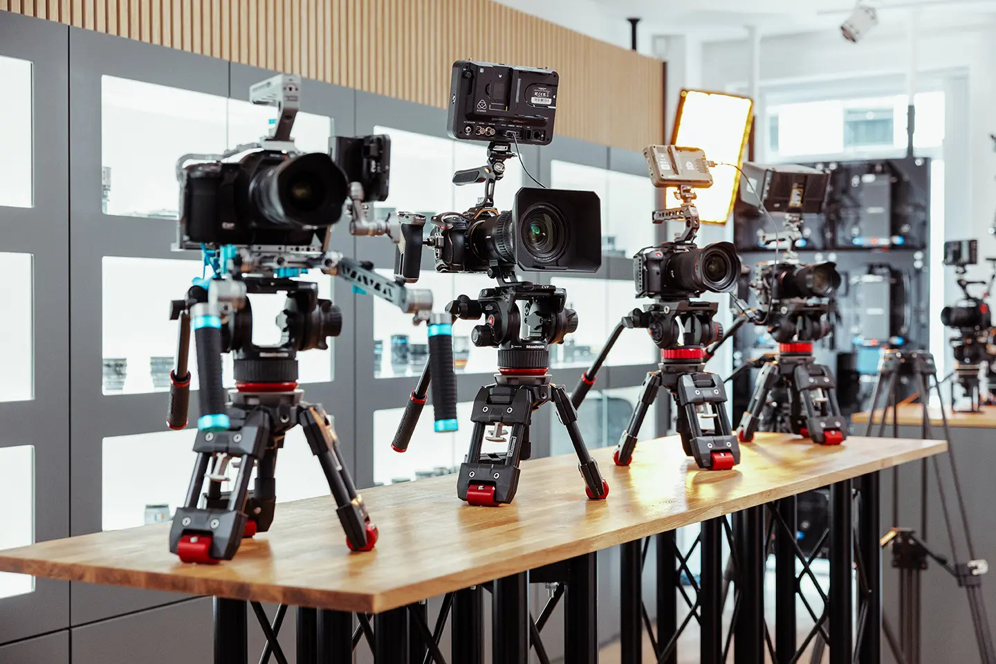 display units with professional camera equipment, camera rigs, camera cages and gimbals