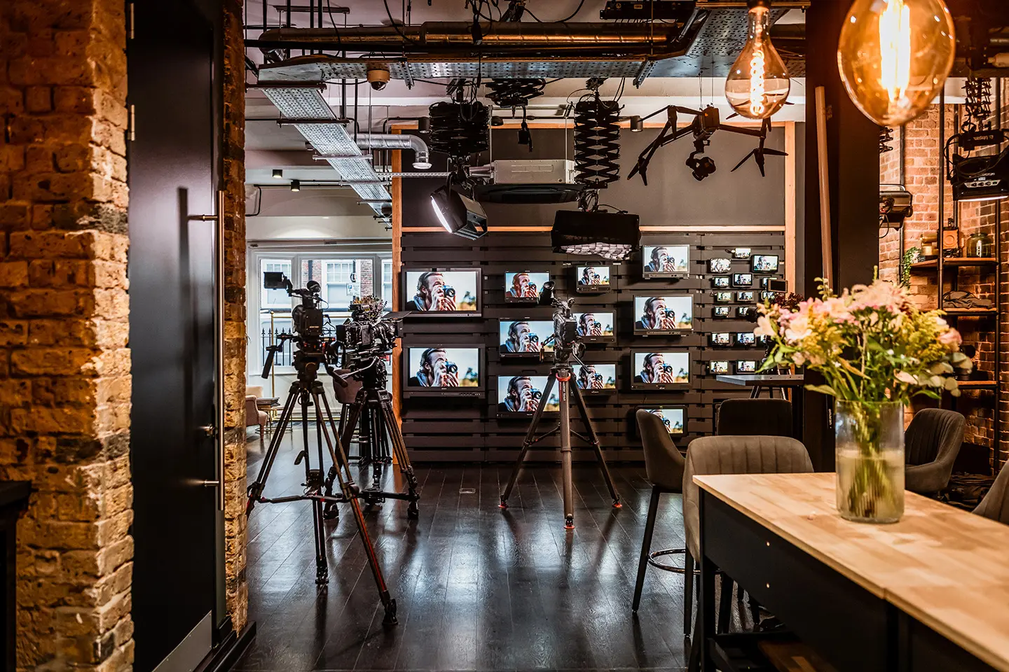 a display of camera monitors with coming soon summer 2023 text